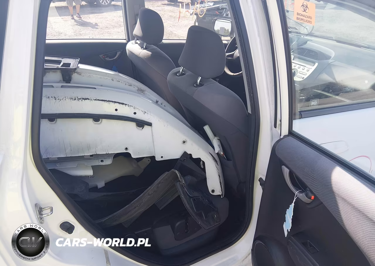 2009 Honda Fit VIN:JHMGE88229C000371 - 8