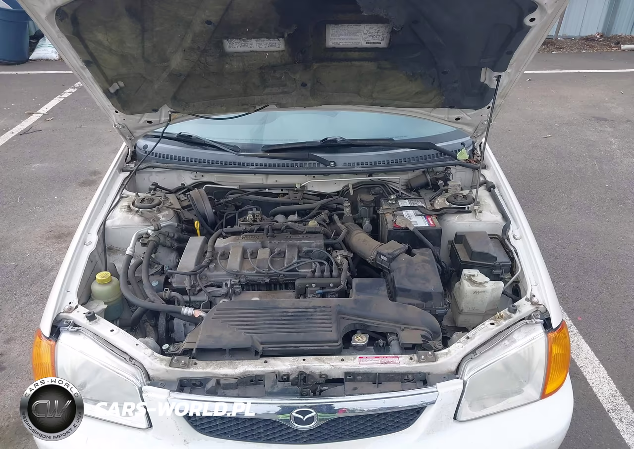 2000 Mazda Protege Es VIN:JM1BJ2218Y0275277 - 10