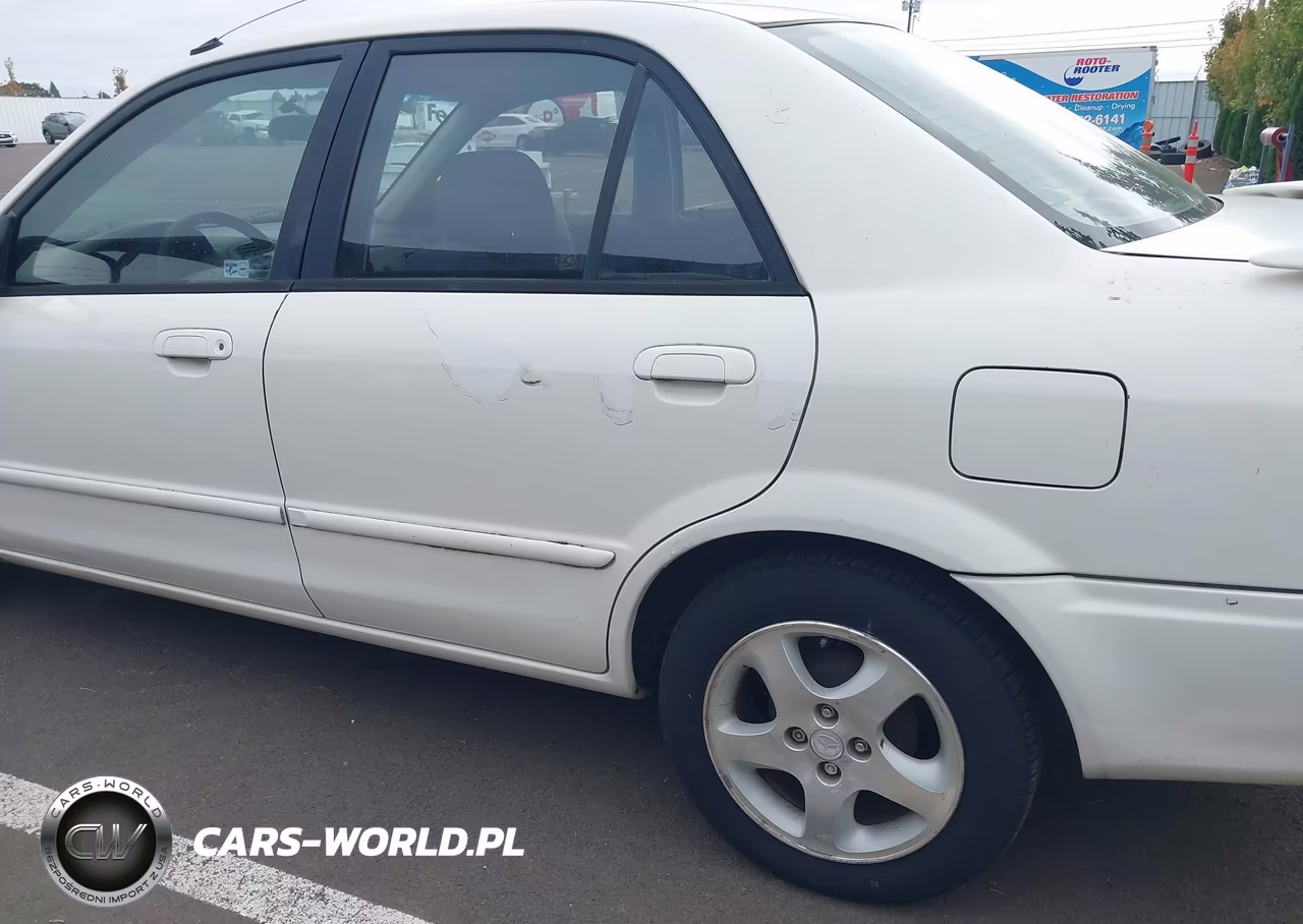 2000 Mazda Protege Es VIN:JM1BJ2218Y0275277 - 13