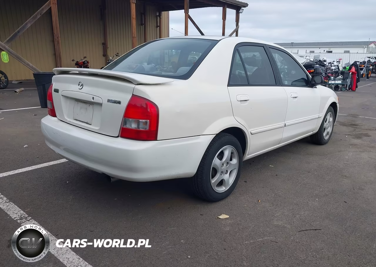 2000 Mazda Protege Es VIN:JM1BJ2218Y0275277 - 4