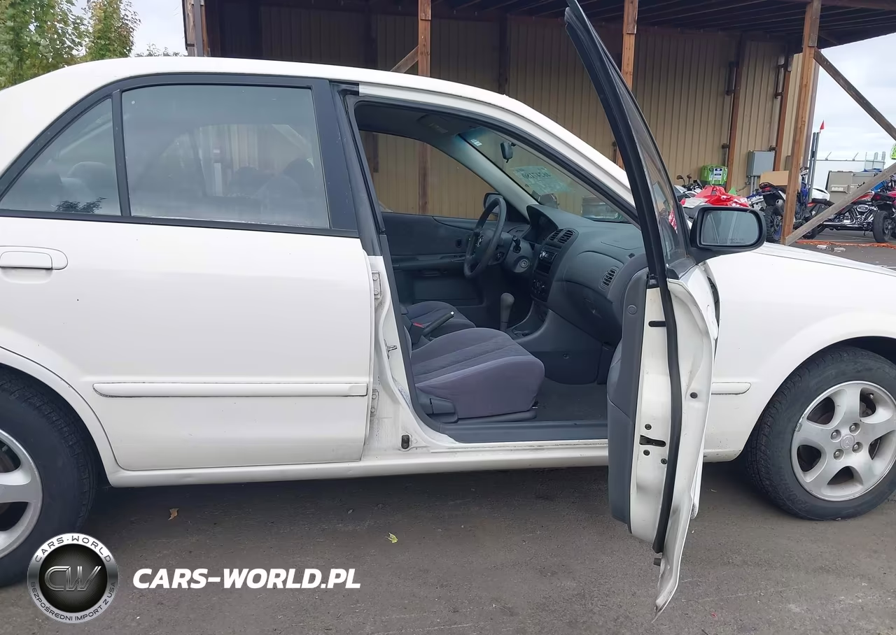 2000 Mazda Protege Es VIN:JM1BJ2218Y0275277 - 5