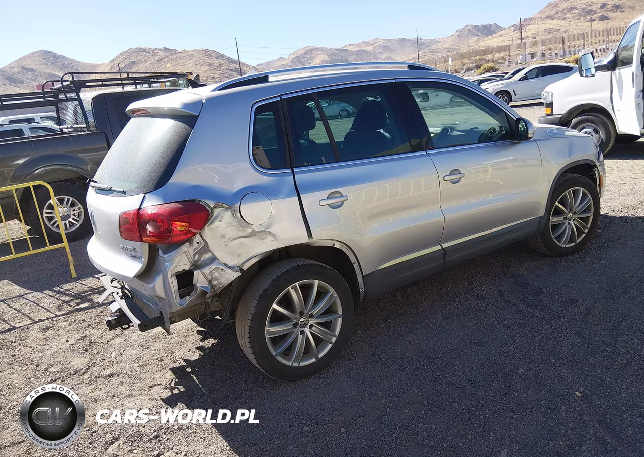 2014 Volkswagen Tiguan Sel VIN:WVGBV3AX4EW581588 - 4