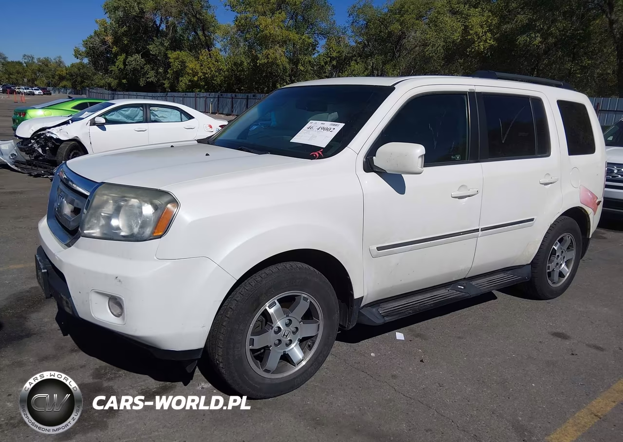 2011 Honda Pilot Touring VIN:5FNYF4H95BB101065 - 2