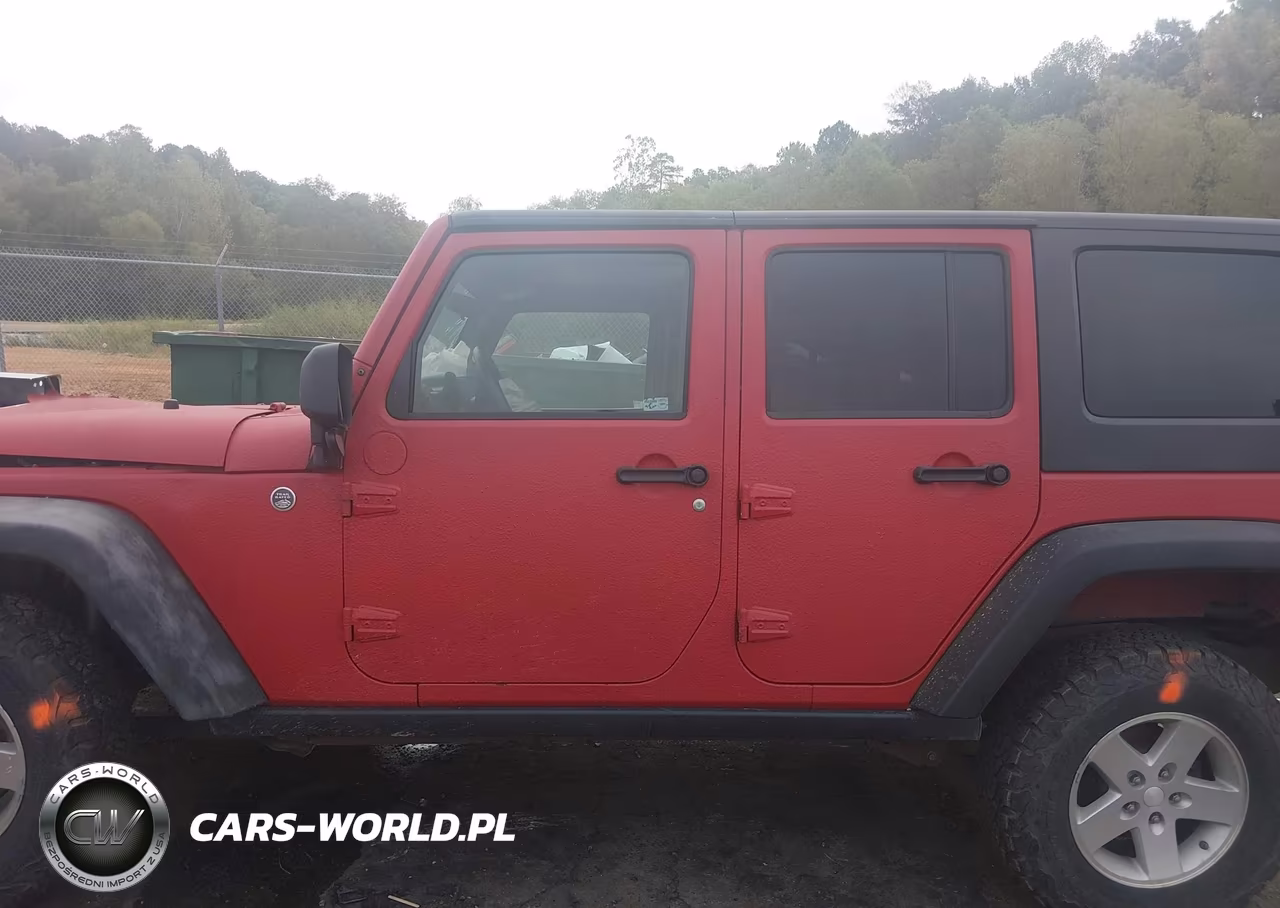 2009 Jeep Wrangler Unlimited Rubicon VIN:1J4GA69109L704165 - 14