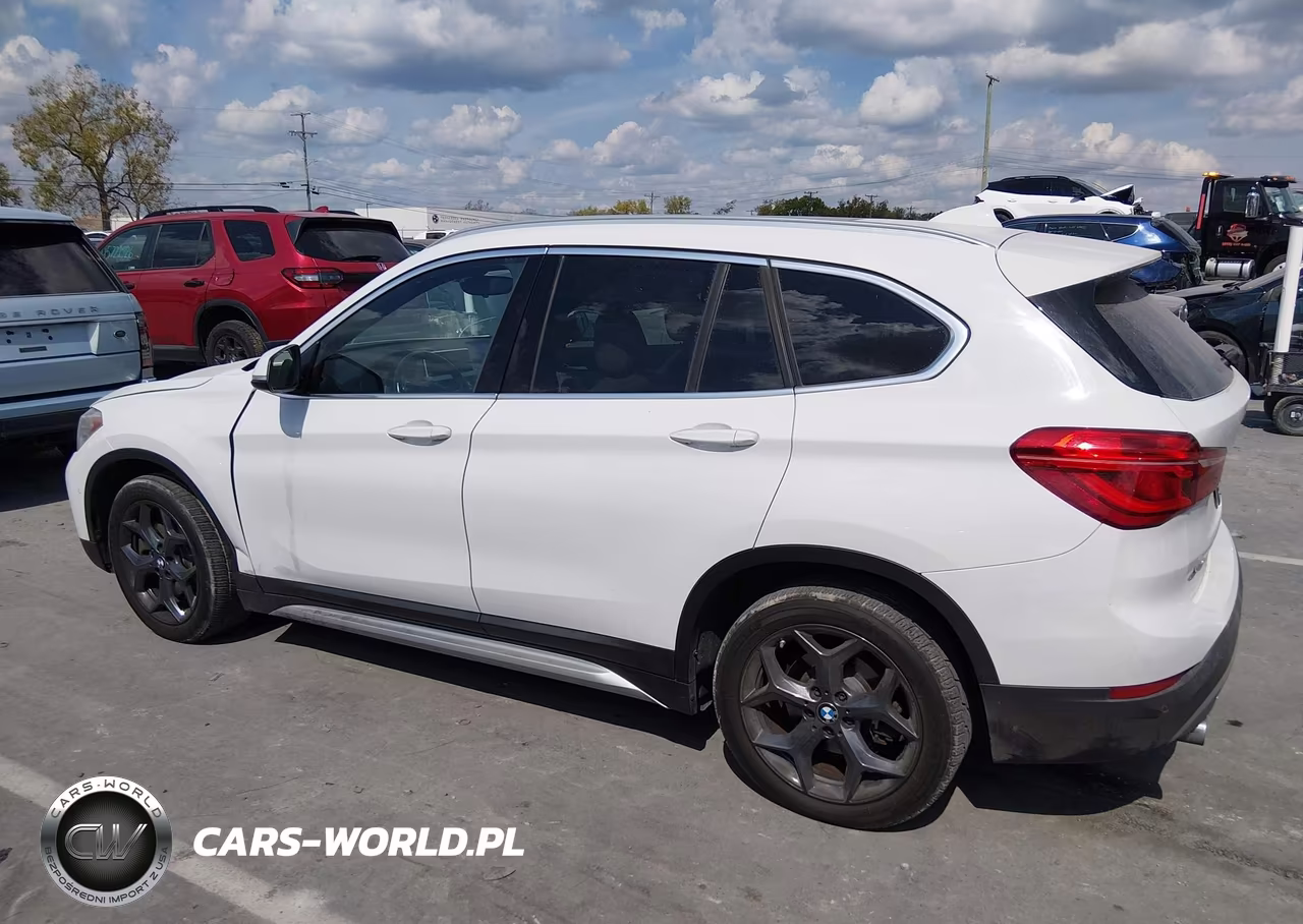 2018 BMW X1 xDrive28I VIN:WBXHT3C34J5L27087 - 14