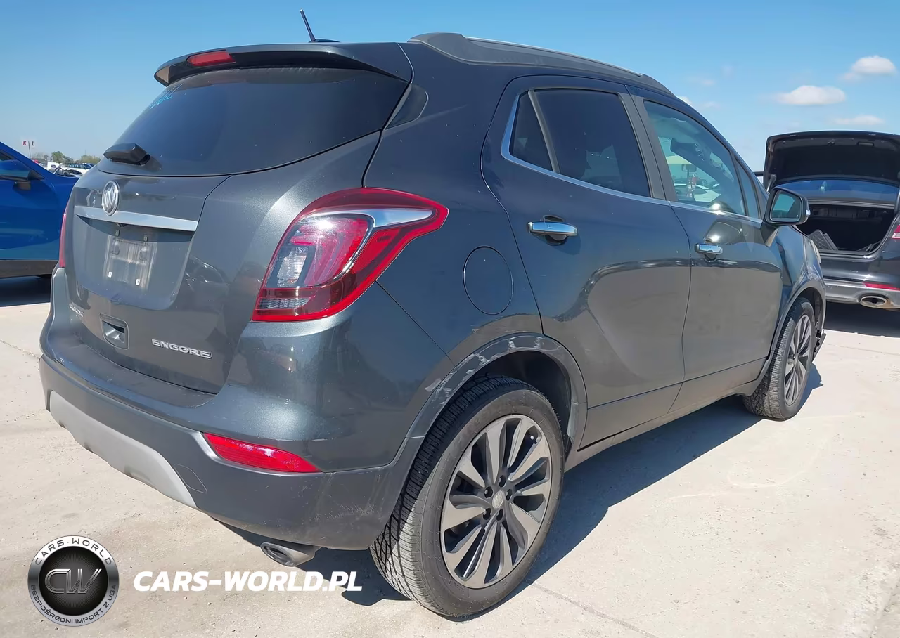 2018 Buick Encore Essence VIN:KL4CJCSBXJB535637 - 4