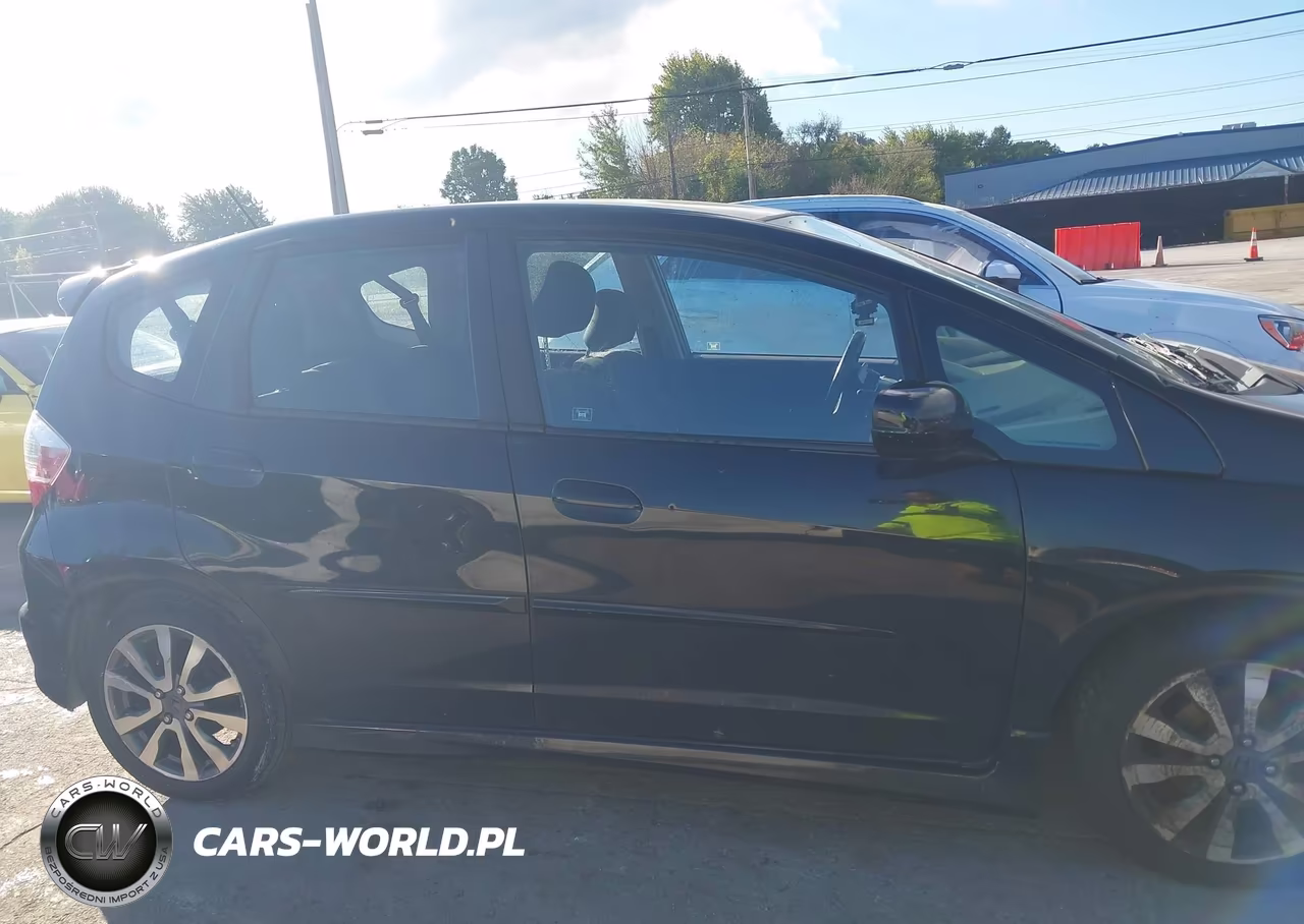 2012 Honda Fit Sport VIN:JHMGE8H53CC036880 - 13