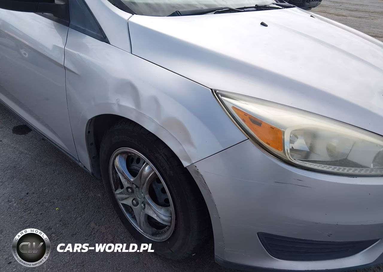 2016 Ford Focus S VIN:1FADP3E25GL379195 - 12