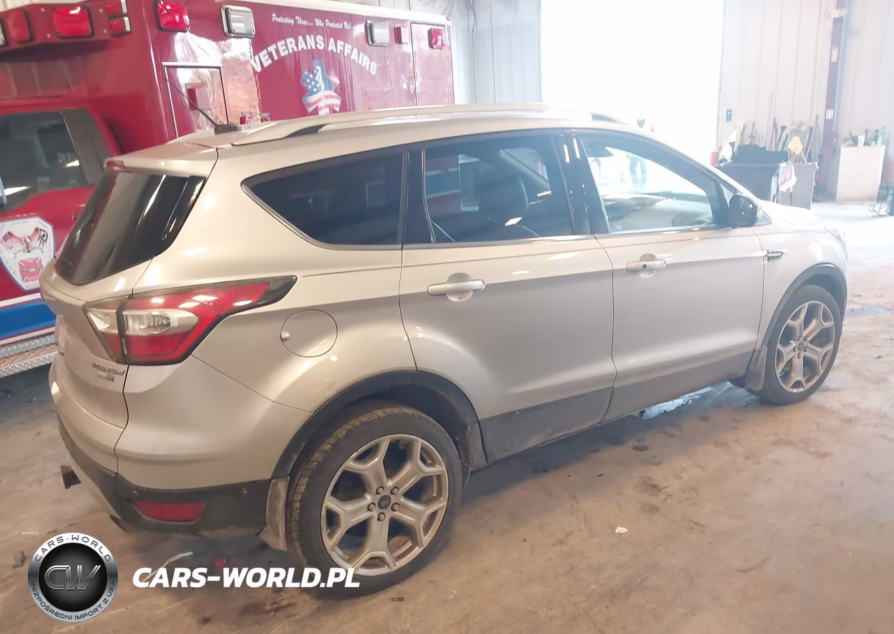 2017 Ford Escape Titanium VIN:1FMCU9J91HUA33656 - 4