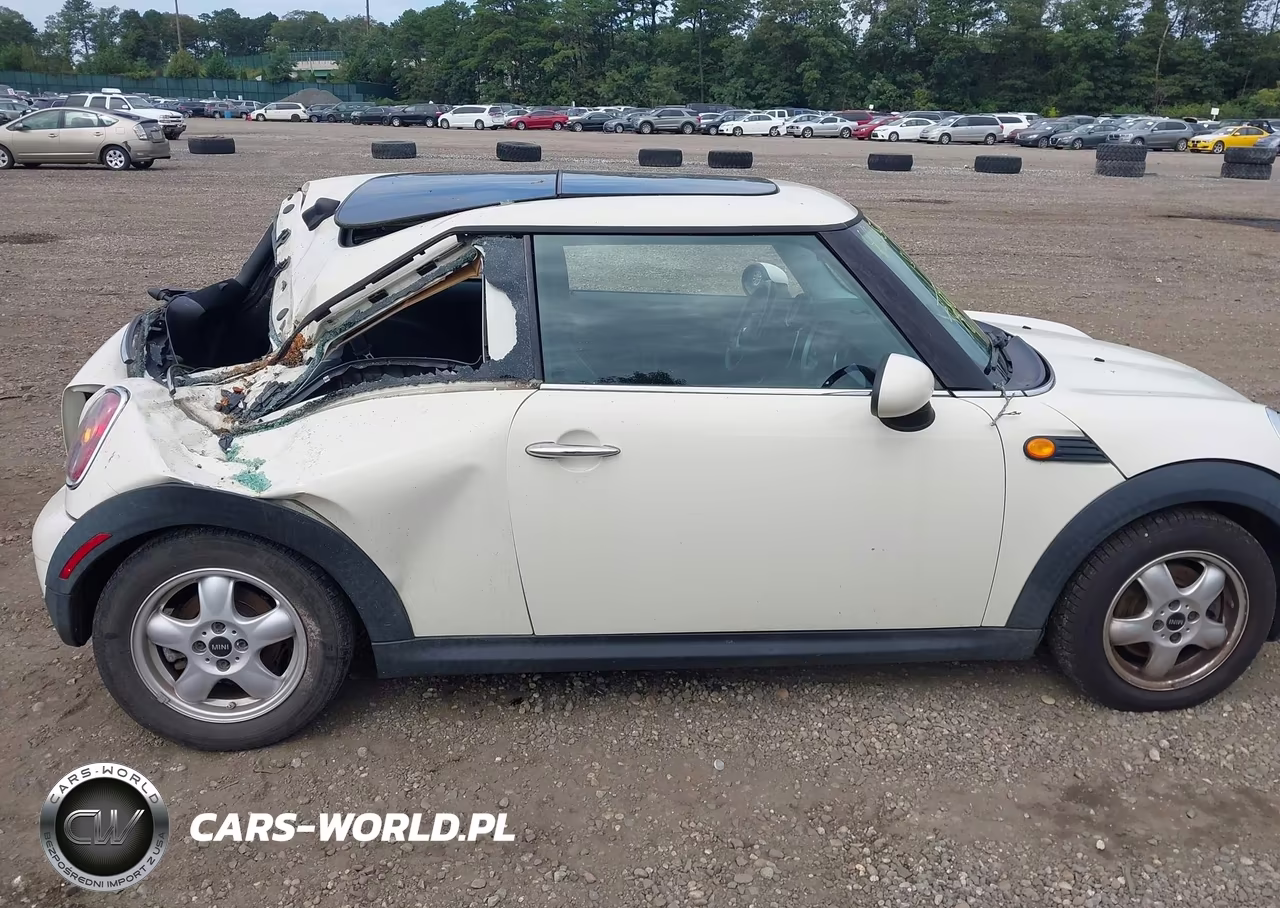 2009 Mini Cooper VIN:WMWMF33549TW77702 - 13