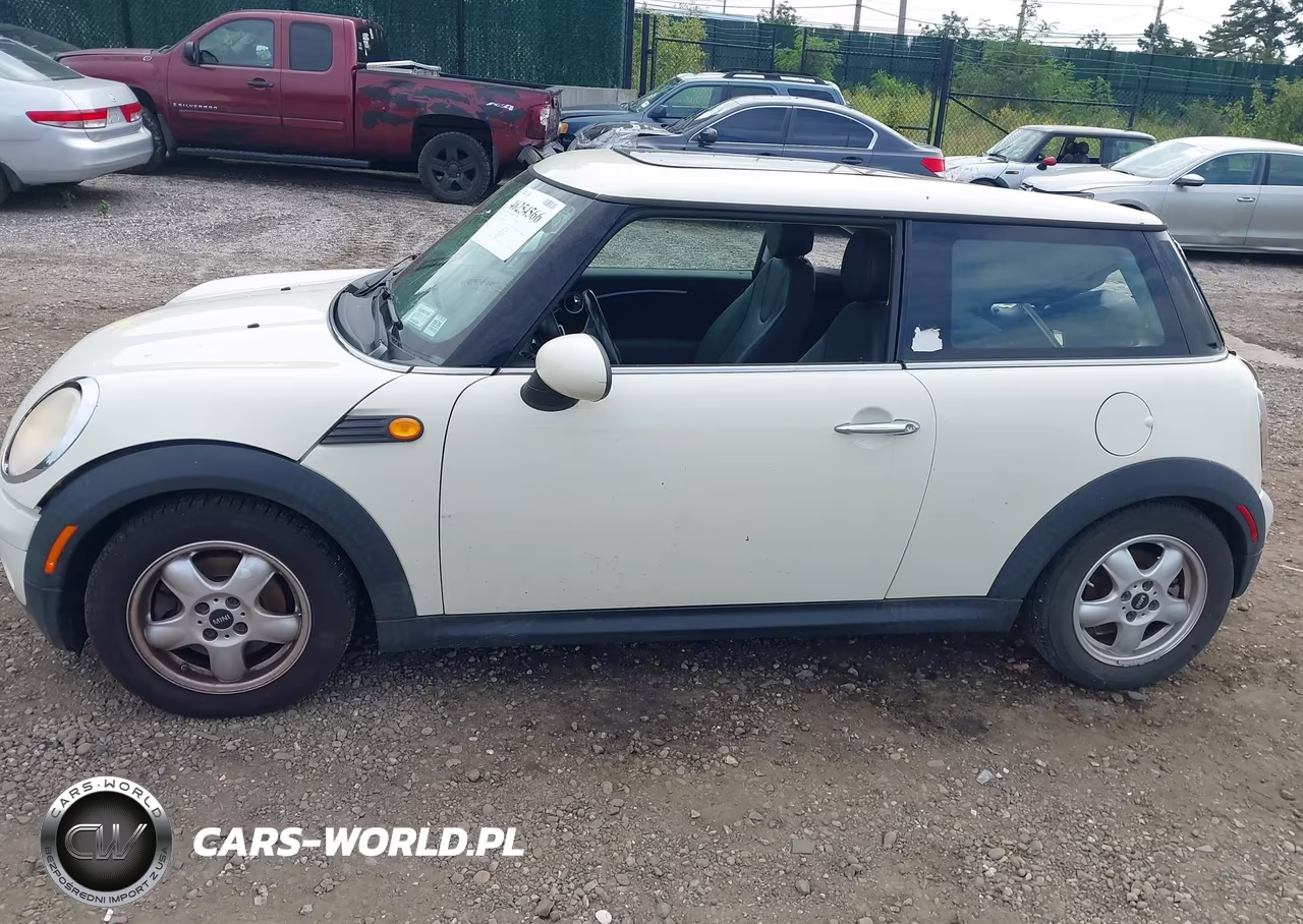 2009 Mini Cooper VIN:WMWMF33549TW77702 - 14