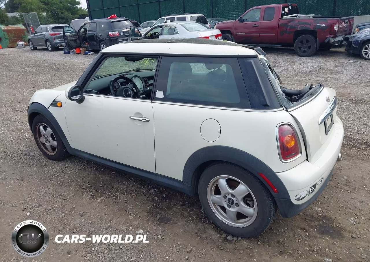 2009 Mini Cooper VIN:WMWMF33549TW77702 - 3