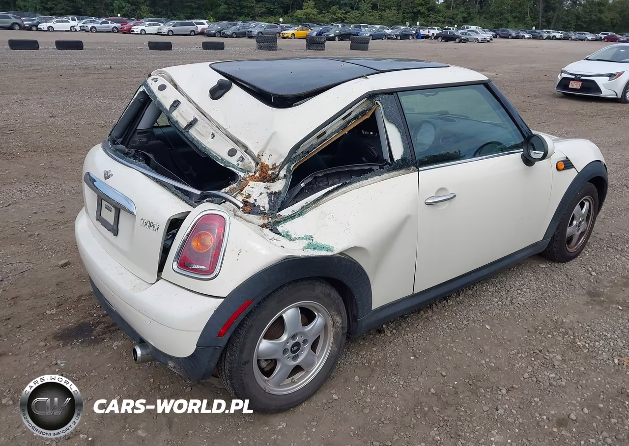 2009 Mini Cooper VIN:WMWMF33549TW77702 - 4