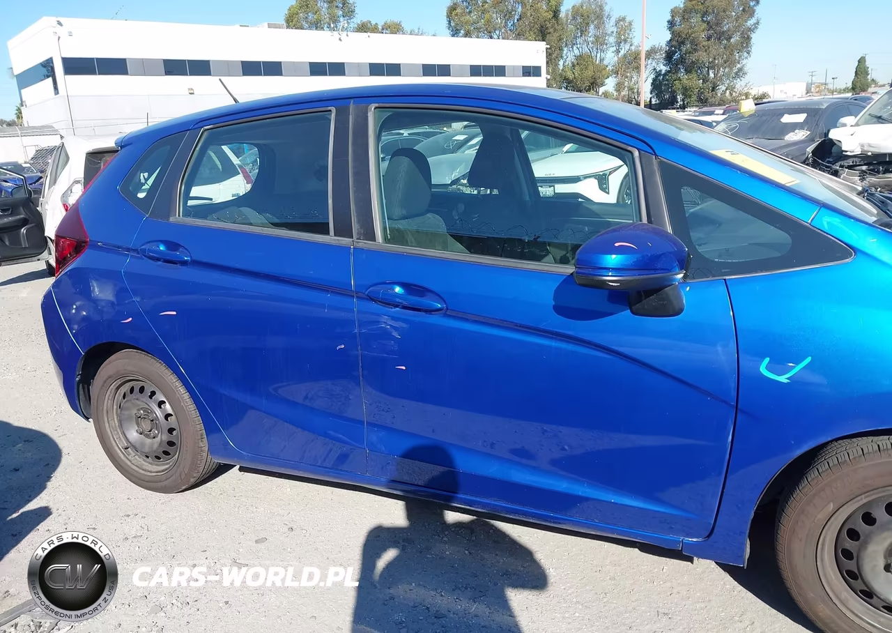 2015 Honda Fit Lx VIN:3HGGK5H52FM774215 - 14
