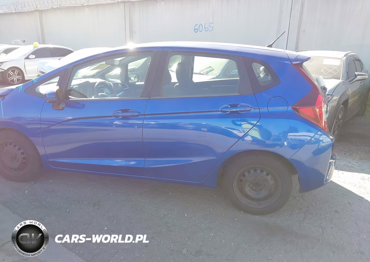 2015 Honda Fit Lx VIN:3HGGK5H52FM774215 - 15