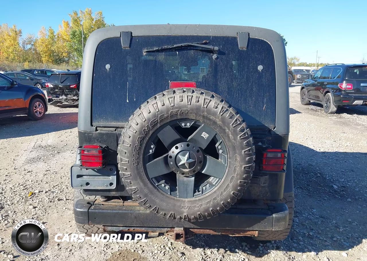 2004 Jeep Wrangler Rubicon VIN:1J4FA69S14P706982 - 16