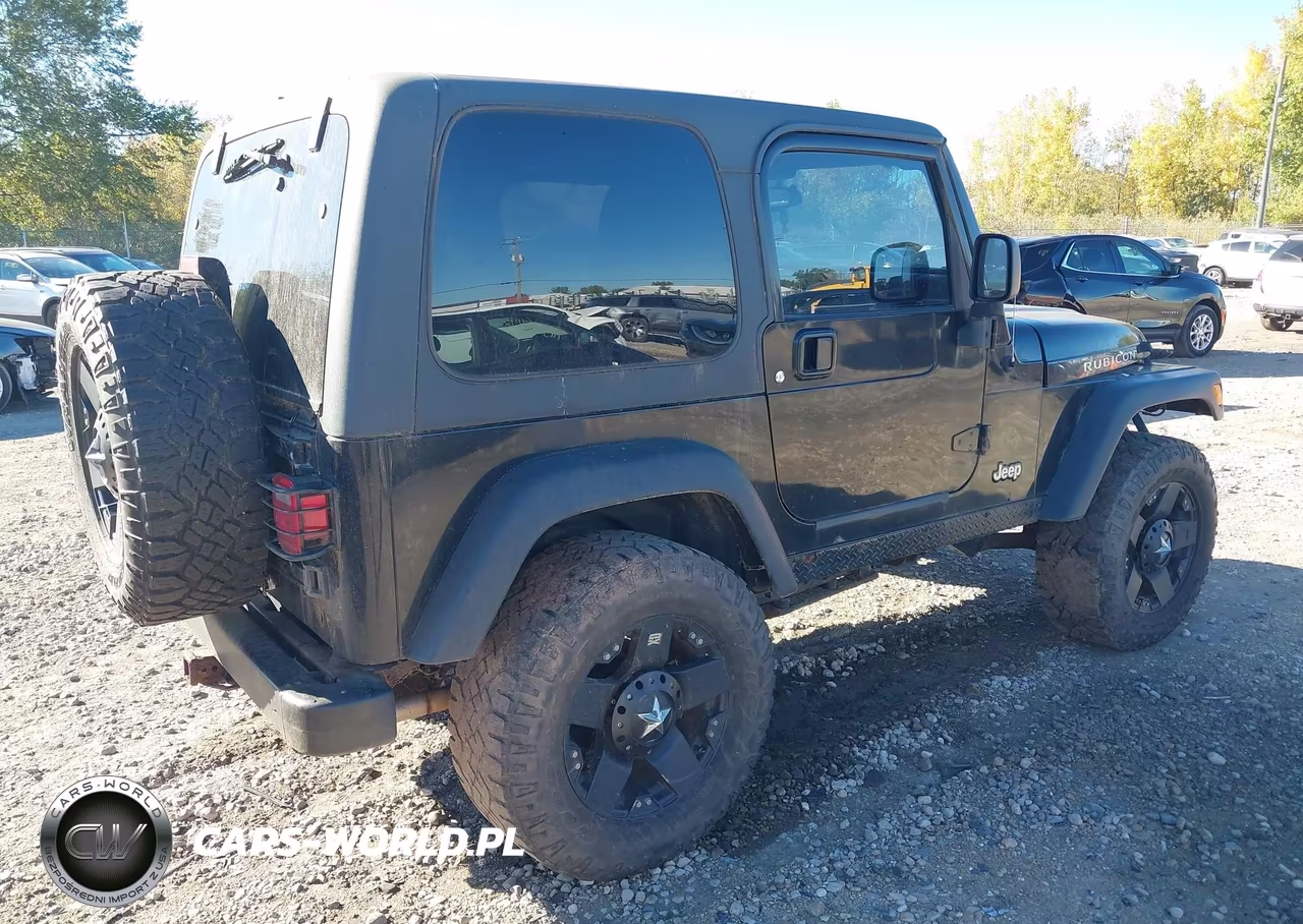 2004 Jeep Wrangler Rubicon VIN:1J4FA69S14P706982 - 4