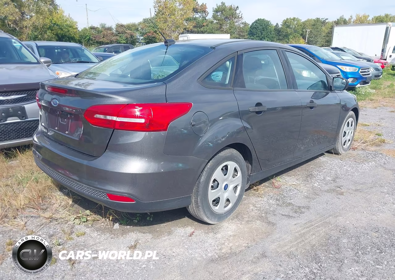 2017 Ford Focus S VIN:1FADP3E29HL321835 - 4