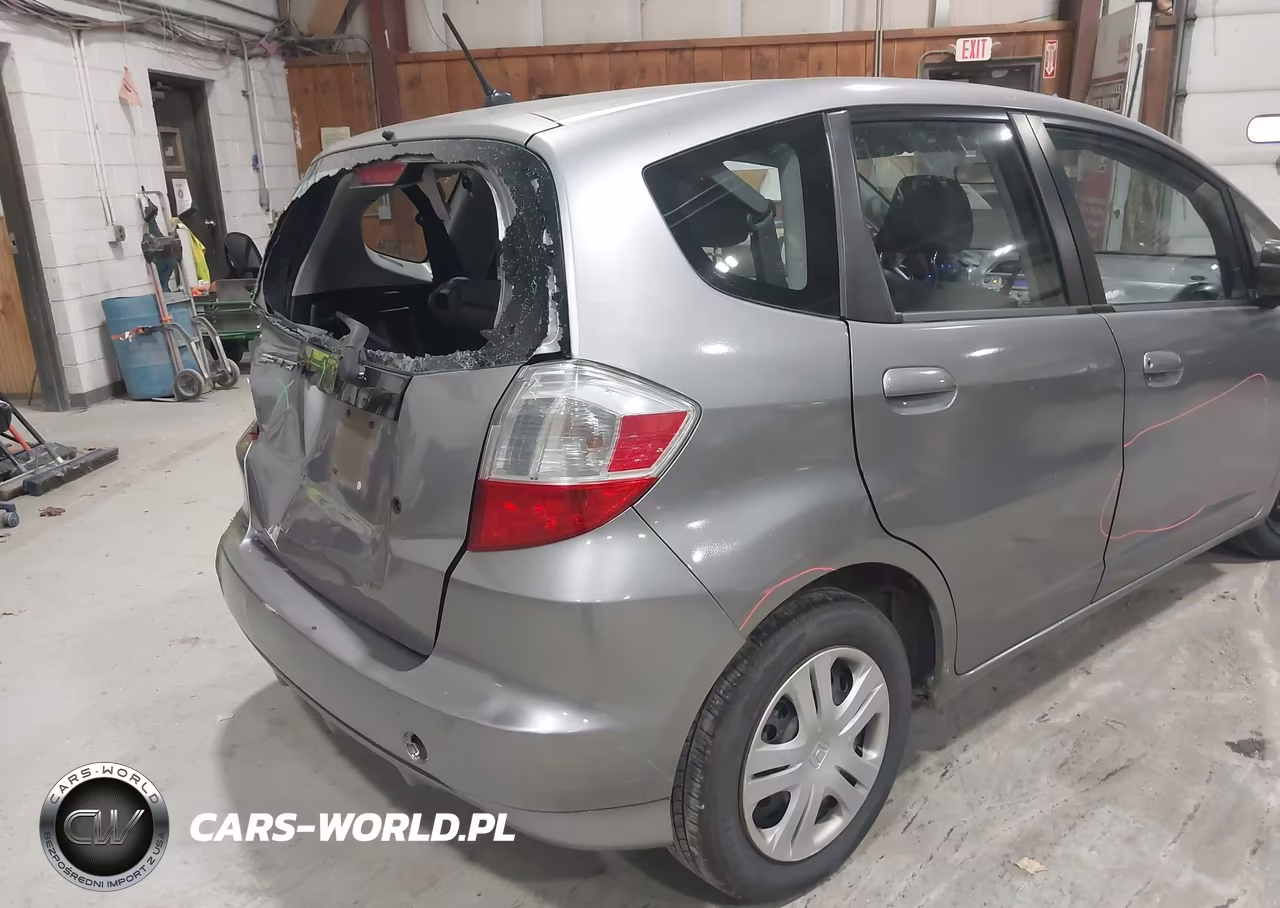 2009 Honda Fit VIN:JHMGE88239S055045 - 13