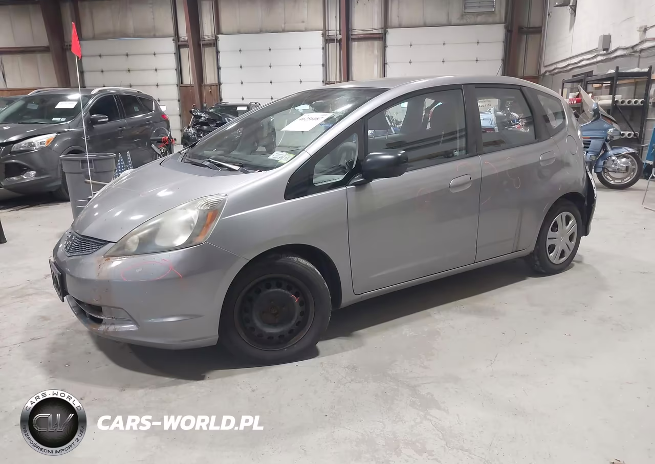 2009 Honda Fit VIN:JHMGE88239S055045 - 2