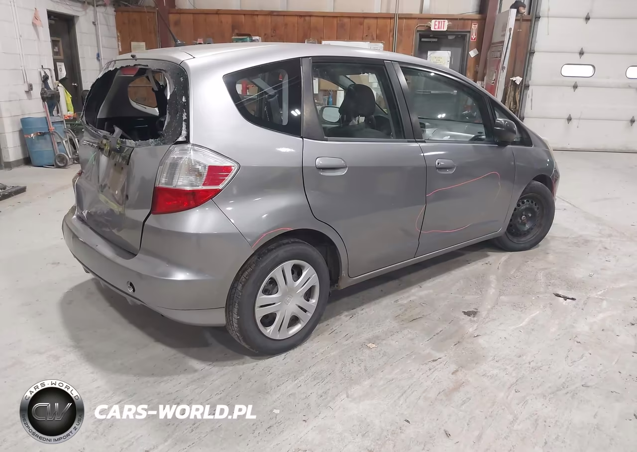 2009 Honda Fit VIN:JHMGE88239S055045 - 4