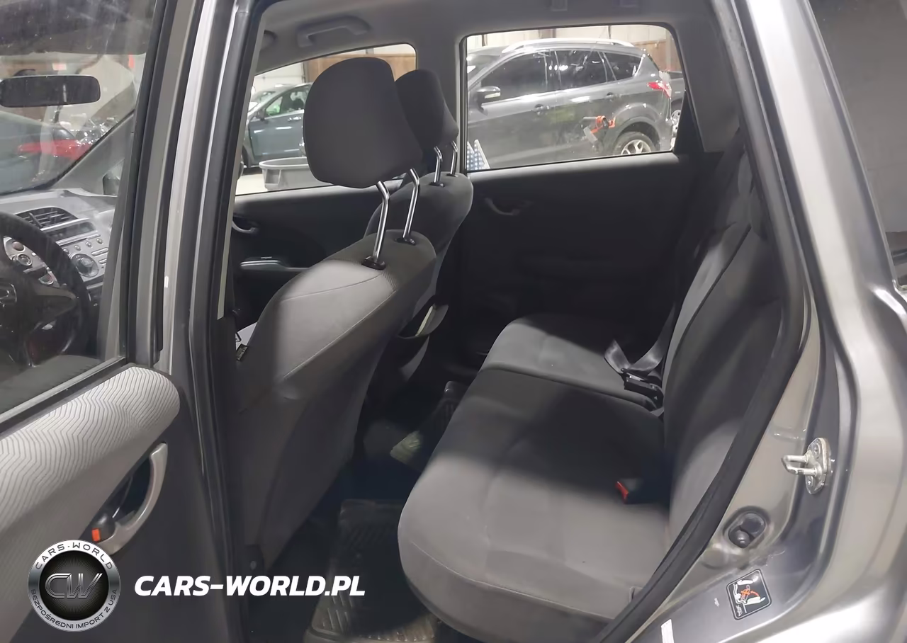 2009 Honda Fit VIN:JHMGE88239S055045 - 8