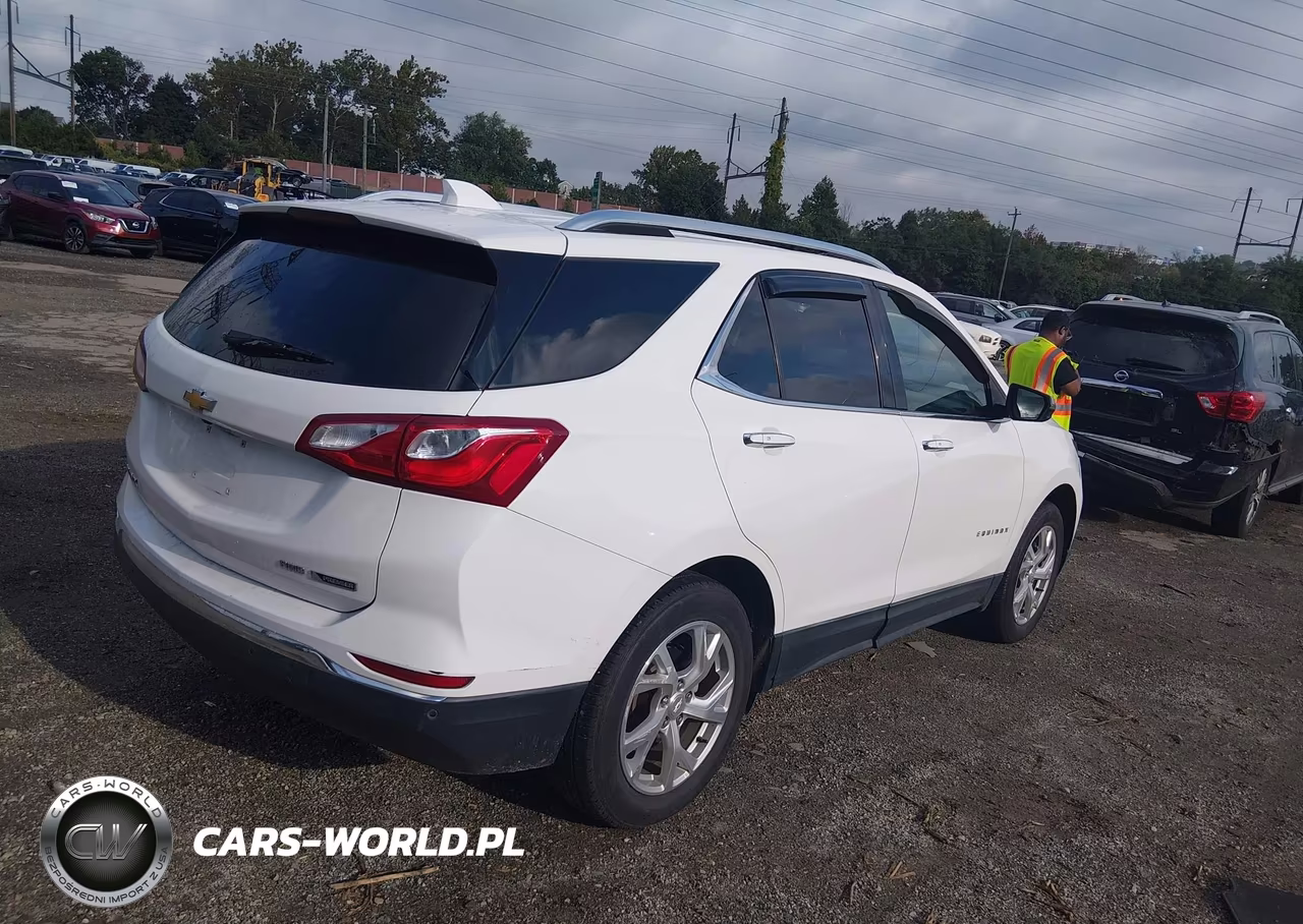 2018 Chevrolet Equinox Premier VIN:3GNAXVEV8JS525116 - 4