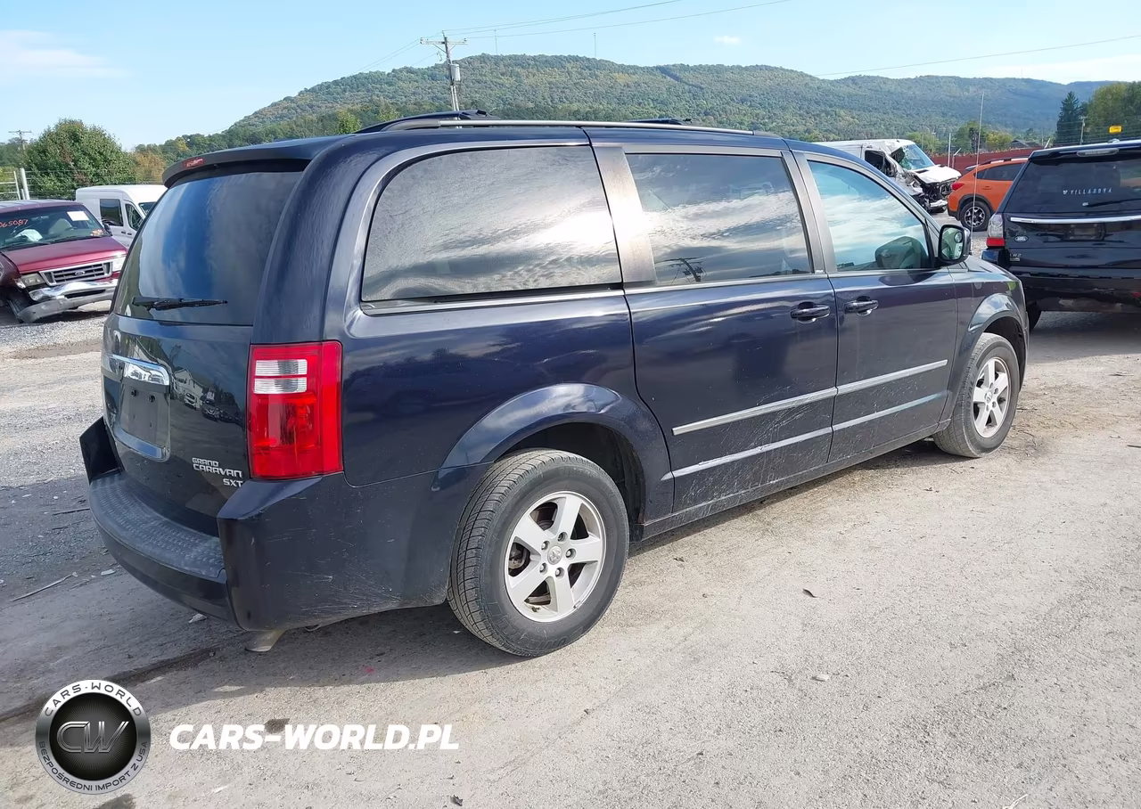 2010 Dodge Grand Caravan Sxt VIN:2D4RN5D17AR411740 - 4