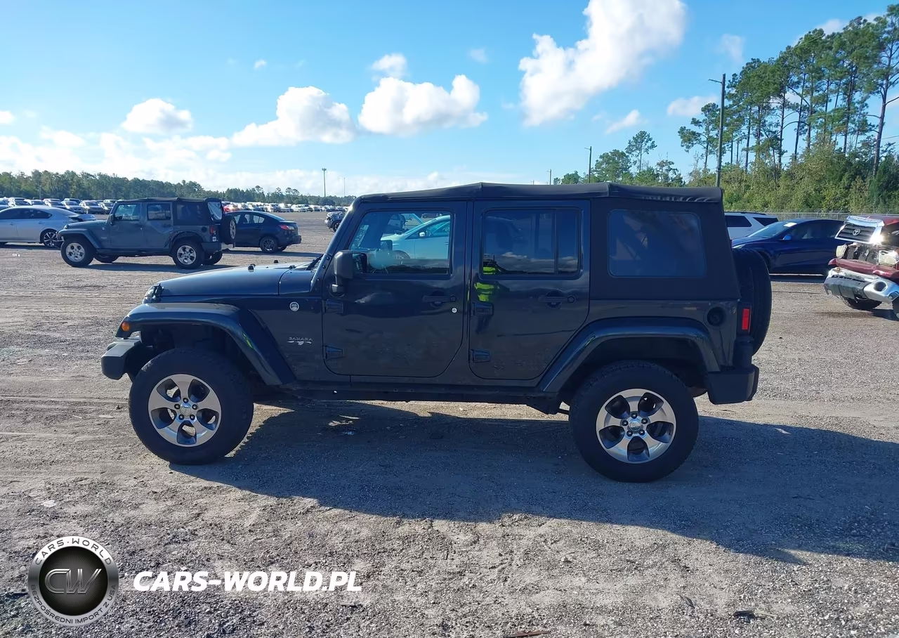 2016 Jeep Wrangler Unlimited Sahara VIN:1C4BJWEGXGL261644 - 14