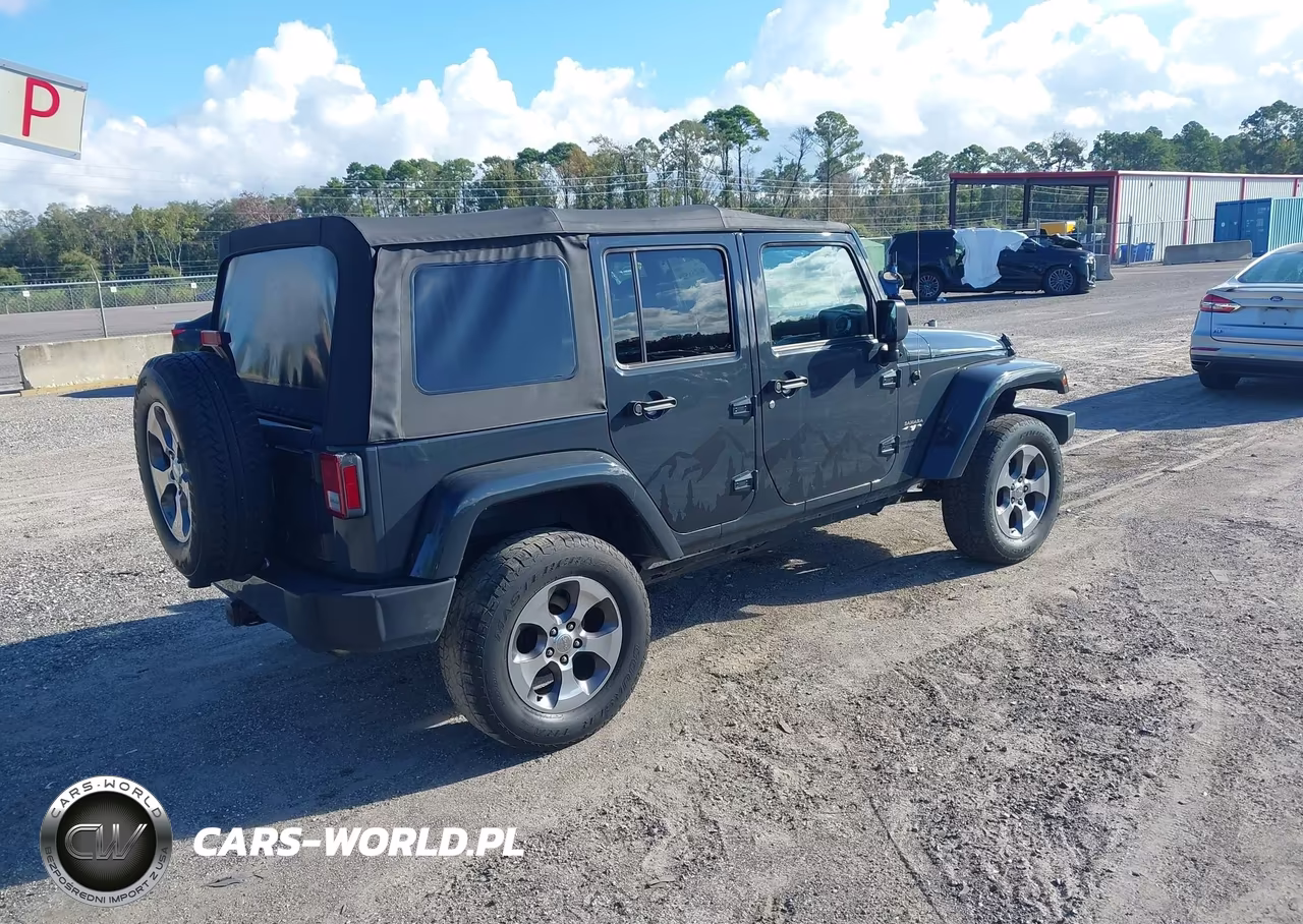 2016 Jeep Wrangler Unlimited Sahara VIN:1C4BJWEGXGL261644 - 4