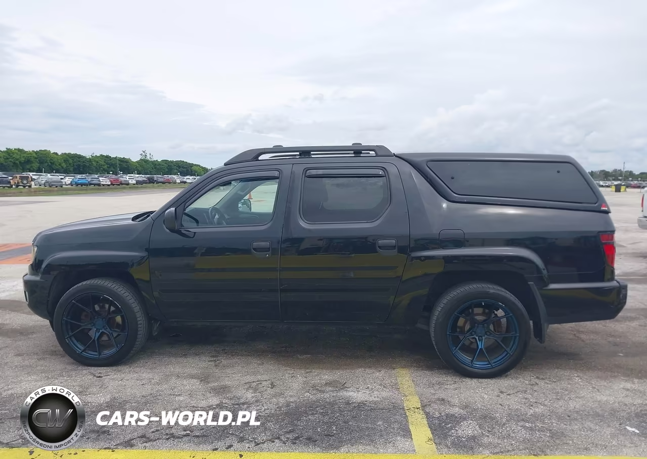 2012 Honda Ridgeline Sport VIN:5FPYK1F7XCB001466 - 14