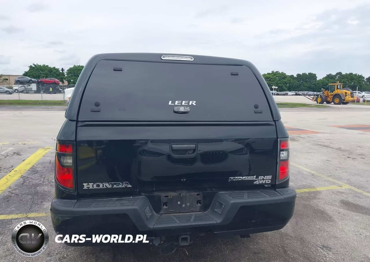 2012 Honda Ridgeline Sport VIN:5FPYK1F7XCB001466 - 16