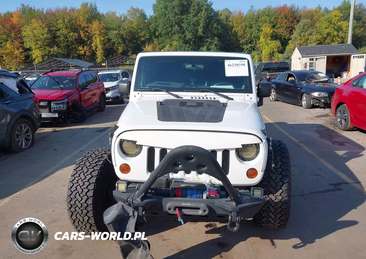 2012 Jeep Wrangler Unlimited Sport VIN:1C4BJWDG3CL119244 - 12