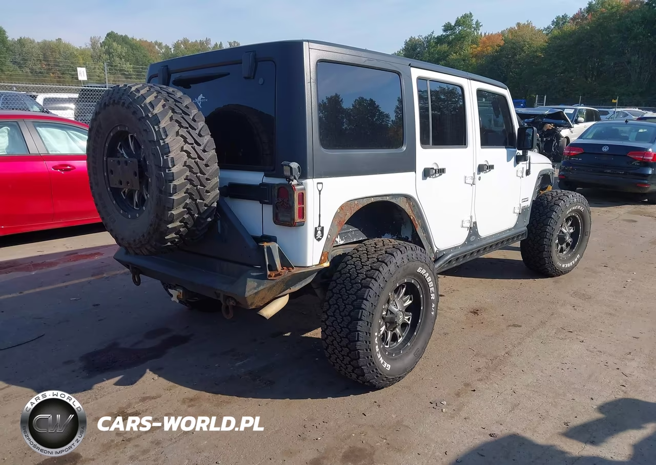 2012 Jeep Wrangler Unlimited Sport VIN:1C4BJWDG3CL119244 - 4