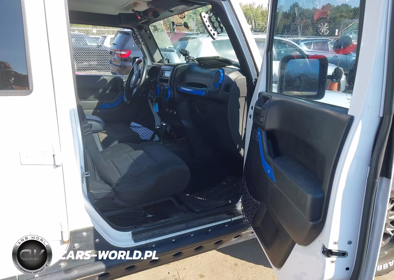 2012 Jeep Wrangler Unlimited Sport VIN:1C4BJWDG3CL119244 - 5