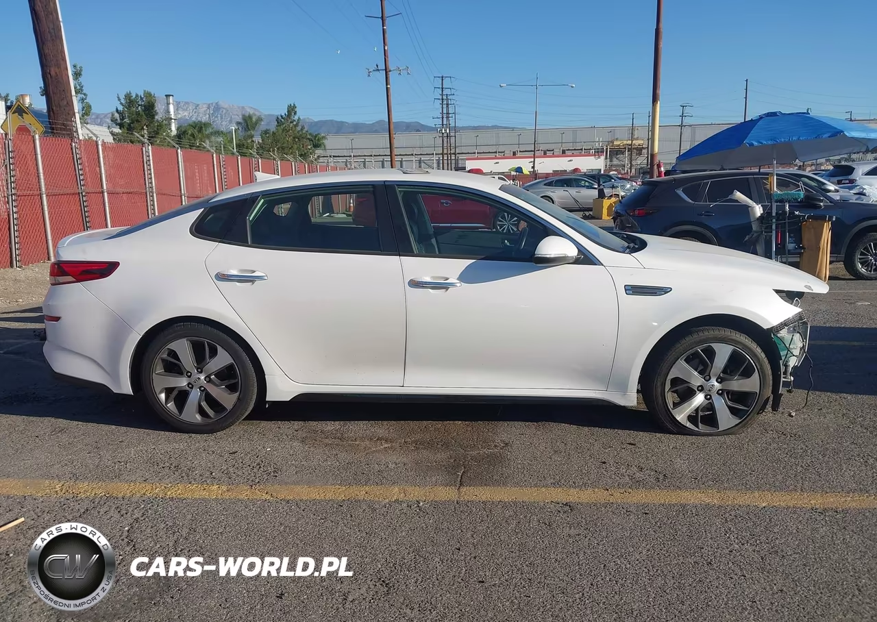 2019 Kia Optima S VIN:5XXGT4L35KG329331 - 14