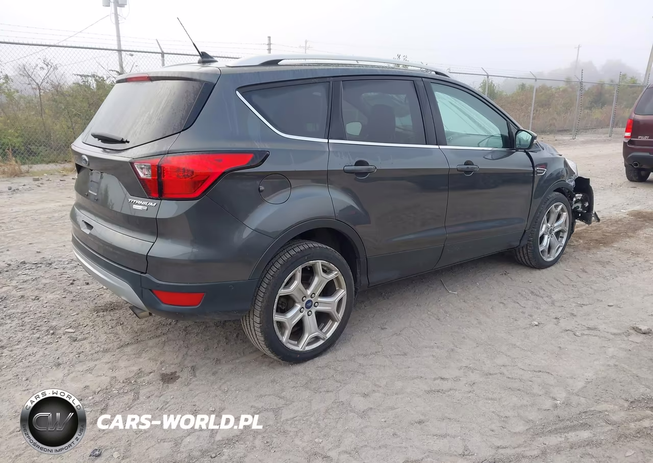 2019 Ford Escape Titanium VIN:1FMCU9J92KUB98607 - 4