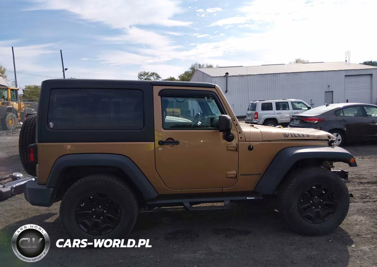 2015 Jeep Wrangler Willys Wheeler VIN:1C4AJWAG7FL714344 - 14