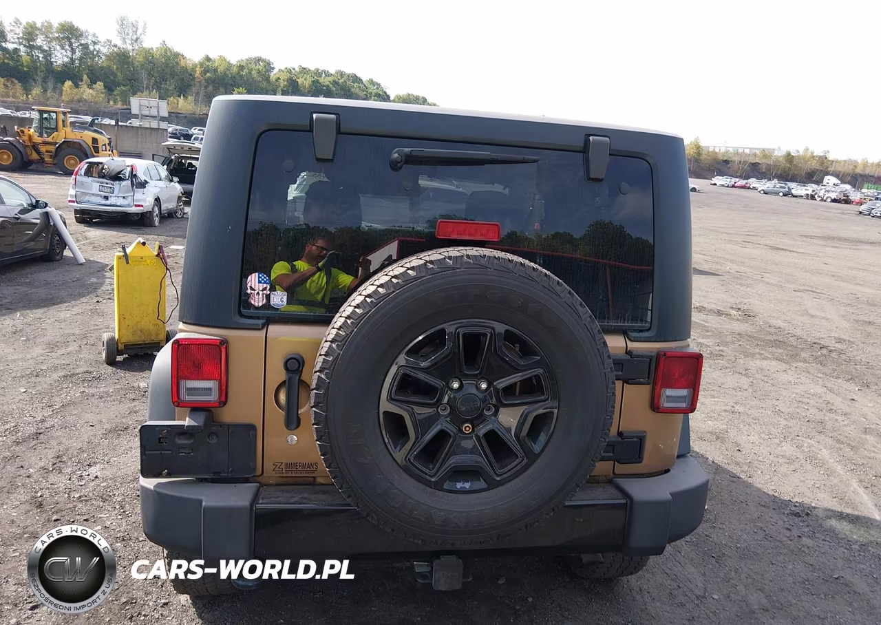 2015 Jeep Wrangler Willys Wheeler VIN:1C4AJWAG7FL714344 - 17