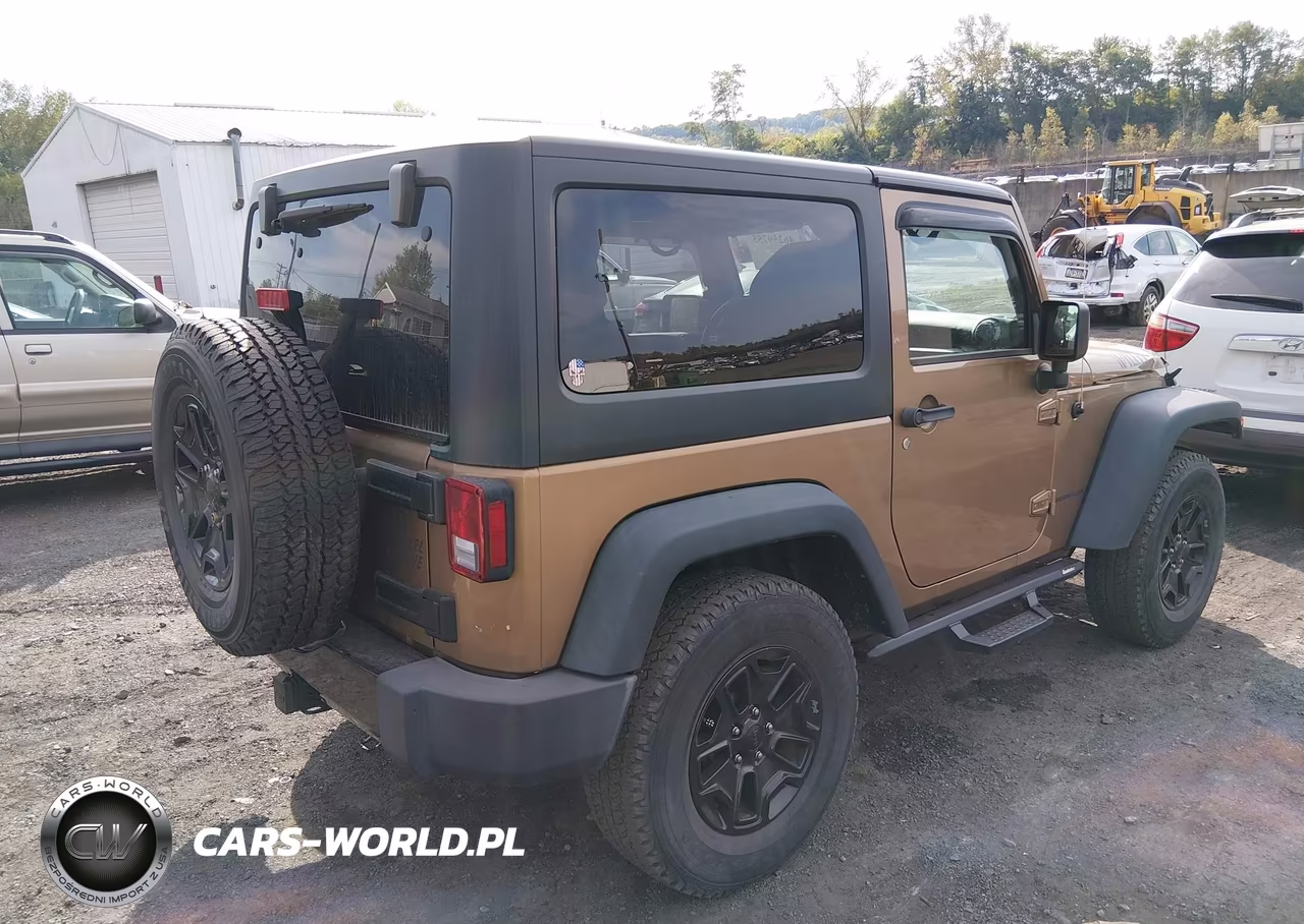 2015 Jeep Wrangler Willys Wheeler VIN:1C4AJWAG7FL714344 - 4