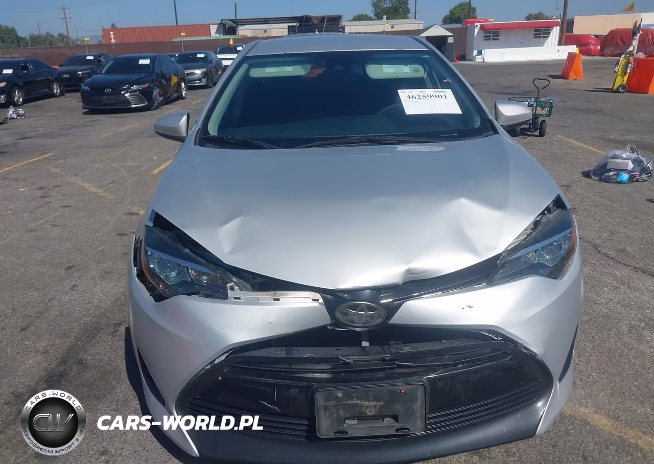 2018 Toyota Corolla Le VIN:5YFBURHE2JP829354 - 12