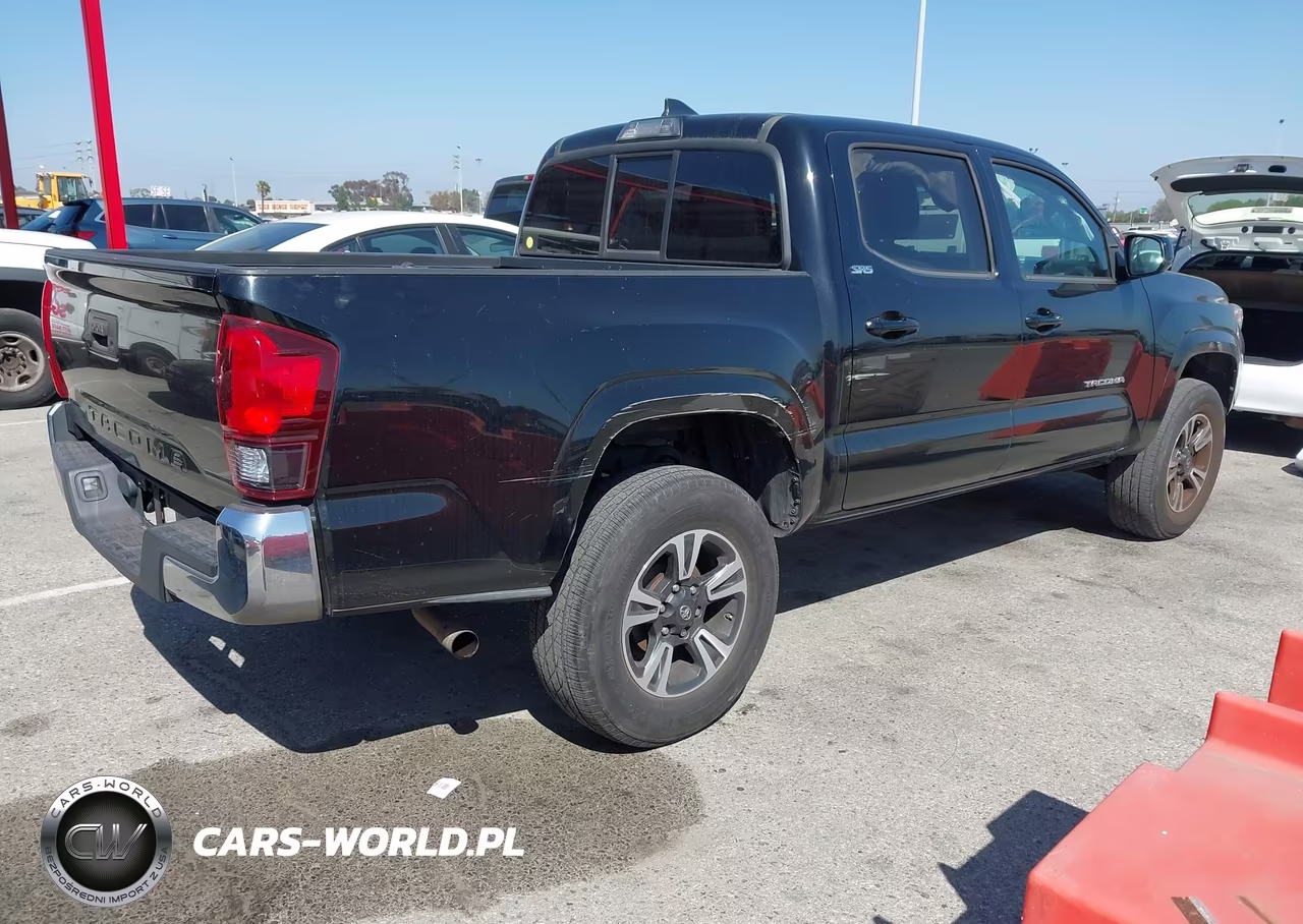 2018 Toyota Tacoma Sr5 VIN:5TFAX5GN4JX105079 - 4