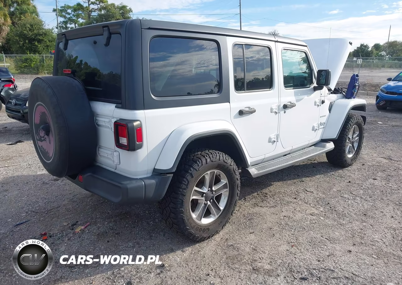 2019 Jeep Wrangler Unlimited Sahara 4X4 VIN:1C4HJXEG0KW514820 - 4
