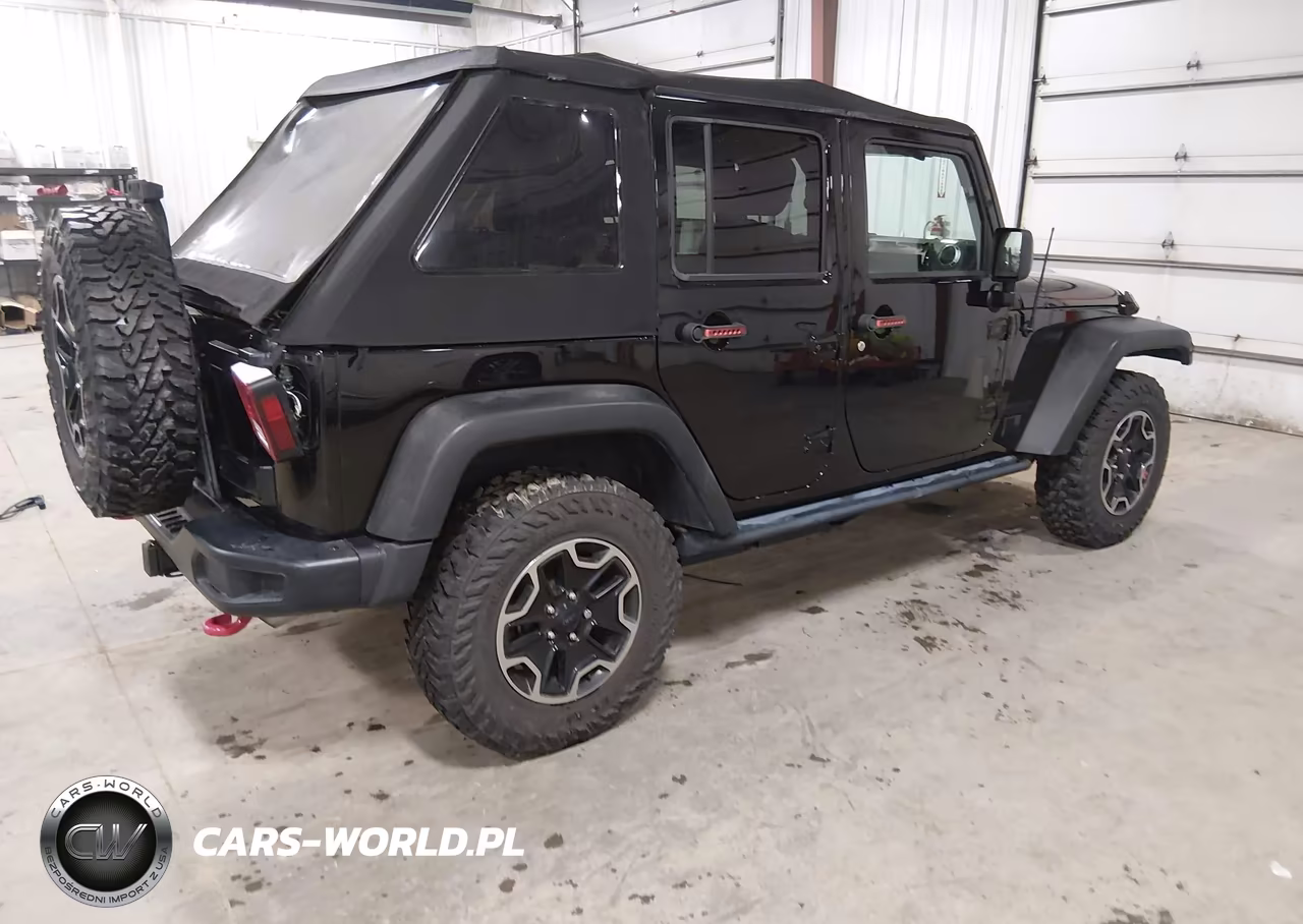 2015 Jeep Wrangler Unlimited Rubicon Hard Rock VIN:1C4HJWFG3FL760194 - 4