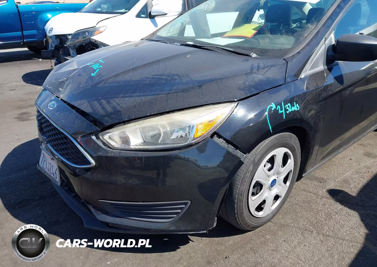 2016 Ford Focus S VIN:1FADP3E25GL225585 - 13