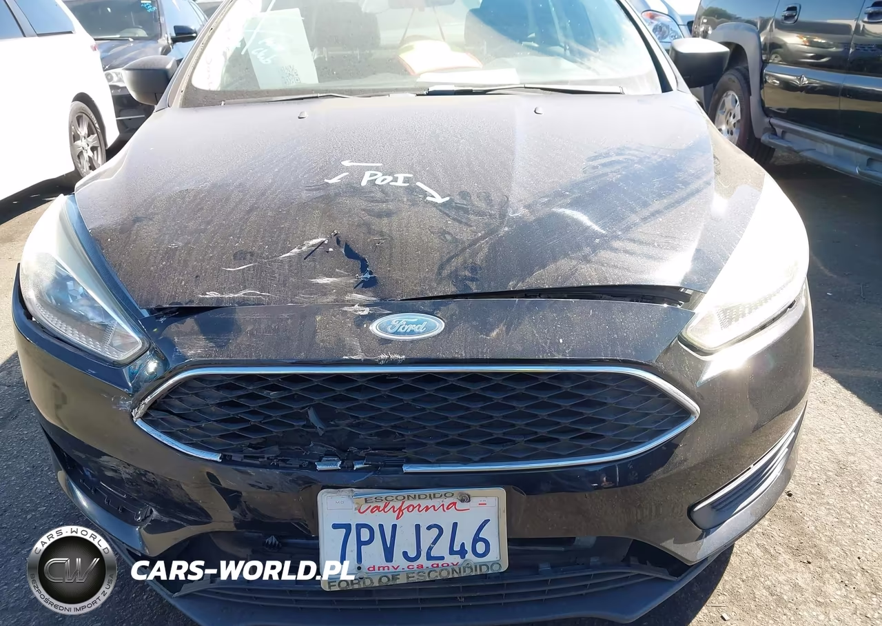 2016 Ford Focus S VIN:1FADP3E25GL225585 - 14
