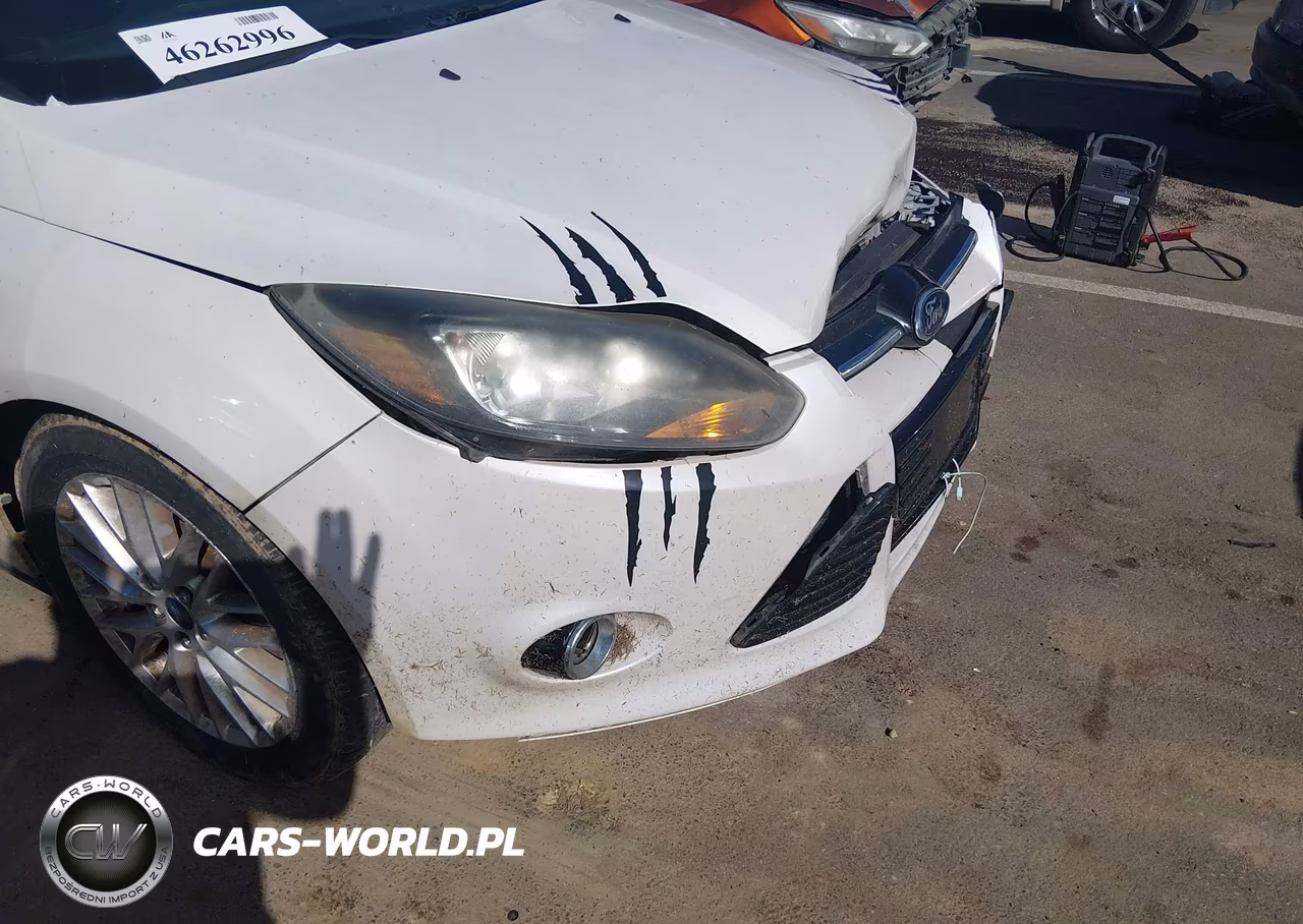 2013 Ford Focus Titanium VIN:1FADP3J23DL198694 - 13
