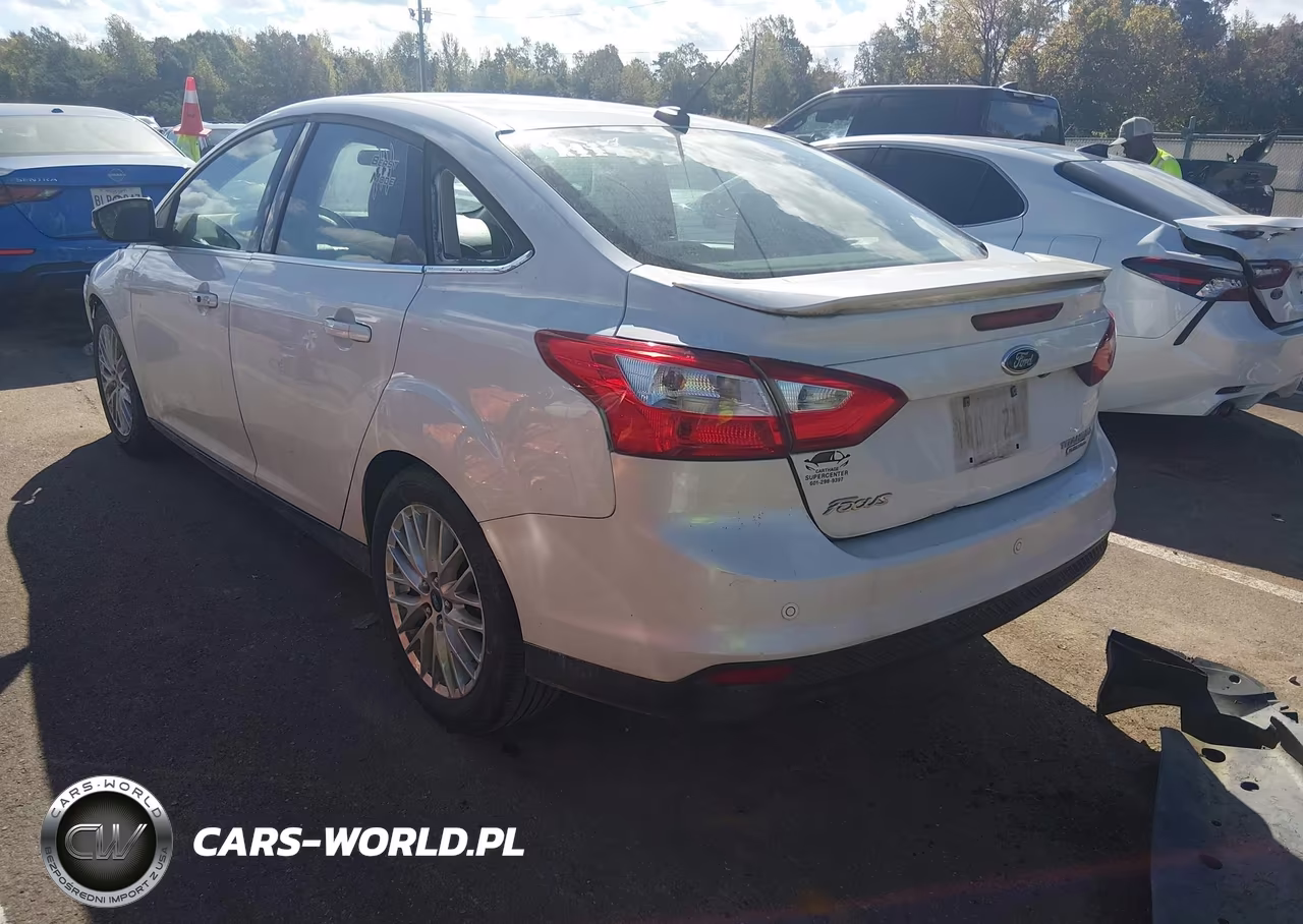 2013 Ford Focus Titanium VIN:1FADP3J23DL198694 - 3