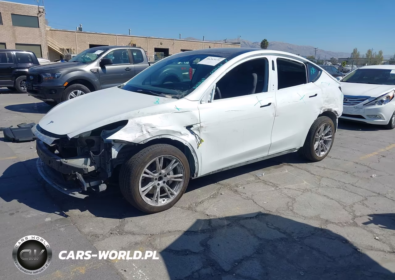 2023 Tesla Model Y Awd-Long Range Dual Motor All-Wheel Drive VIN:7SAYGDEE4PF663175 - 2