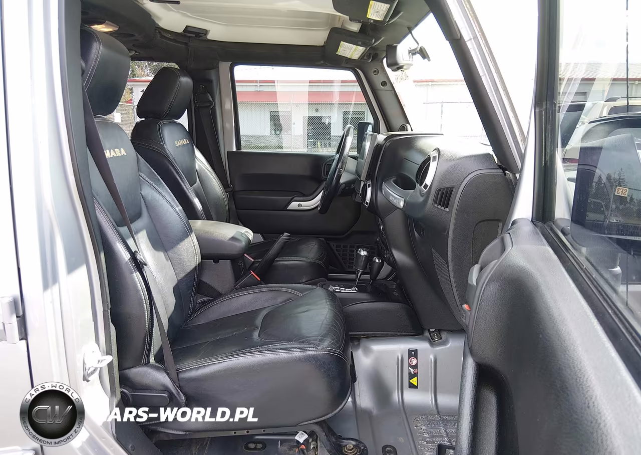 2013 Jeep Wrangler Unlimited Sahara VIN:1C4BJWEG2DL609674 - 18